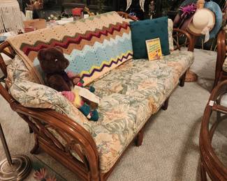 Beautiful vintage Rattan furniture set extremely good quality very heavy.
Large couch loveseat coffee table 2 end tables and oversized chair