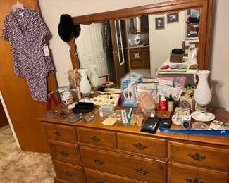 Dresser with mirror and milk glass lamps