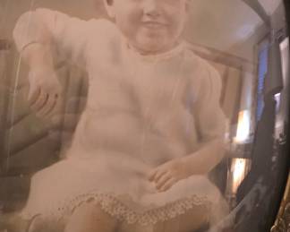 Vintage bubble glass picture frame With the absolute CREEPIEST child with a Old man's head Ive ever seen lol 