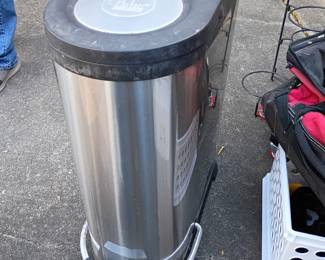 Palm restaurant trash can.