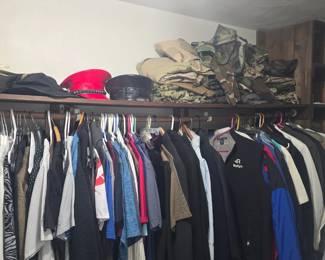 closet full of clothes ties, hats, gloves, etc etc 