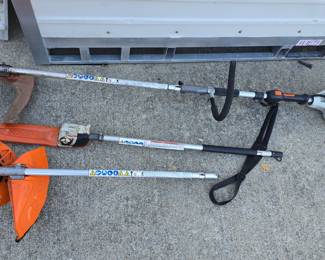 Still straight shaft Weed Eater. With chainsaw and brush attachments.
