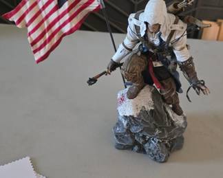 Assassin's Creed statue.
