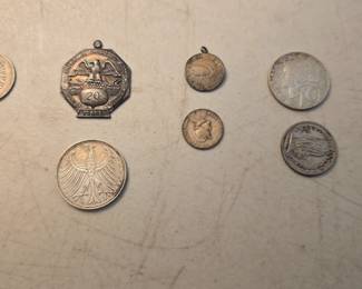 Foreign silver coins.