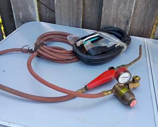 TONS OF TOOLS  AND SUPPLIES!! im not naming them all but handtools, eletric tools, looks like a small home depot lol 