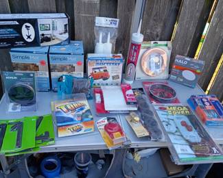 TONS OF TOOLS  AND SUPPLIES!! im not naming them all but handtools, eletric tools, looks like a small home depot lol 