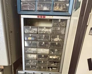 Full of nails and screws and other items.