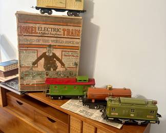 Lionel Electric Train Cars and track.