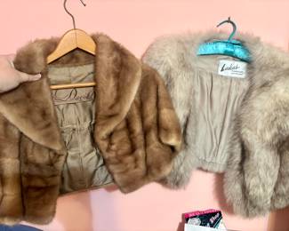 Fur coats (2 short and 1 long) and a set of white fur muffs.