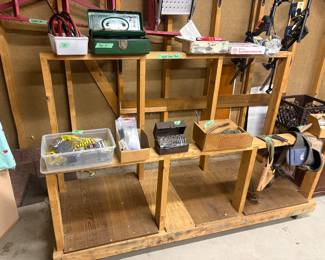 Wood storage unit on wheels.