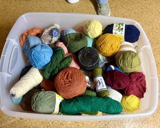 Tons of yarn and weaving supplies.