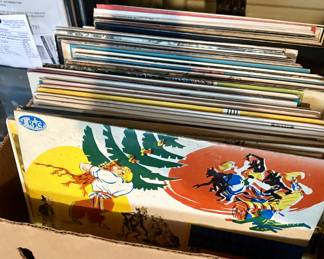 Collection of various genres of records.