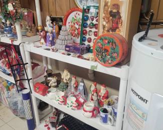 Bottom shelf xmas tree train.