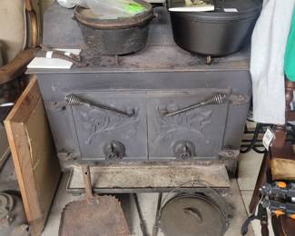 Cast iron pots     stove is NOT for sale