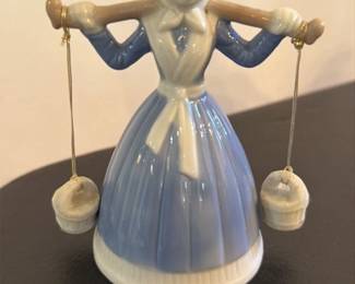 Porcelain Figurine of a Girl with a Yoke