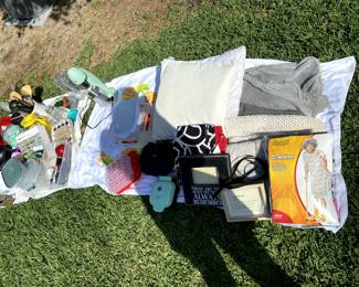 kitchen and bathroom items. Pillows, blanket, bath mat, halloween costume, waffle makers, egg container, ice cream maker