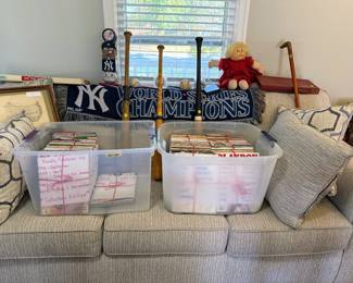 Cabbage Patch Doll, Baseball bats and balls, NY Champion blanket, Monopoly, Scramble, Dominoes, and a collectors set of Playboy magazines.