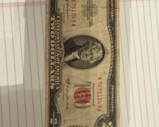 Two Dollar Red Serial Bill. A large collection of coins.