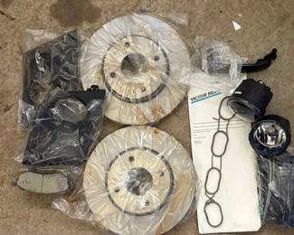 EAT298 Two Brake Rotors, 4 brake Pads, Fog Lights, And A Victor Reinz gasket set