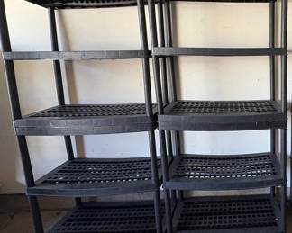 EAT327 two black plastic shelving units