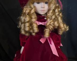 EAT310 - 17" Porcelain Doll In Red Satin