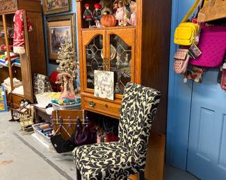 Great parsons chair, name brand purses and bags, dolls, another gallery of wonderful artwork, fabric, throws, blankets, quilts, toys. Broyhill Cabinet with leaded glass and light, Oak Wardrobe, vintage linens.