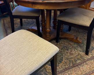 Nice round table.  Notice the pedestals.  2 leaves.  Chairs can be sold w table or individually.