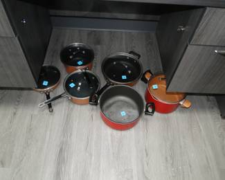 Pots and pans on the floor, who would have thought we would run out of room in a warehouse