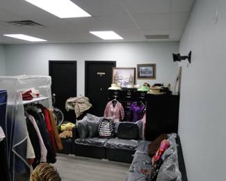 Everything that you see is going to be for sale, winter coats, hats, dresses, file cabinets