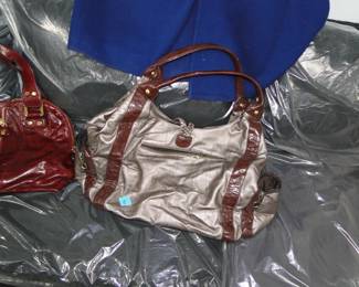 A larger handbag, to carry bricks, or phone books