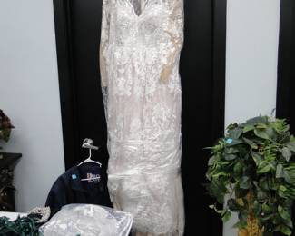 Wedding dress.  Never used, this was, according to the bride the "Backup" dress
