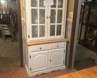 White china cabinet part of dining table and chairs