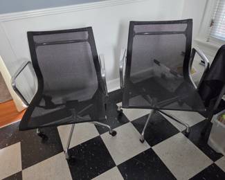 Two Eames "Mesh" Armchairs