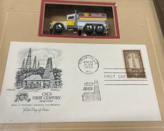 First day, cover stamp, and matchbox truck