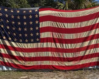 Collection of American flags from the 1890s to modern. From 45 to 50 stars.