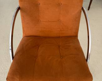 Another chrome chair w/orange ultrsuede upholstery