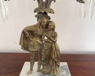 Pair of ornate, figural candelabra