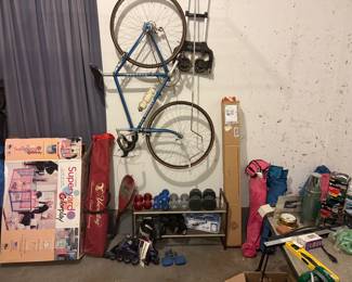 More outdoor items, including rollerblades, free weights, outdoor tent and chairs.