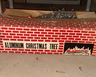 Vintage aluminum Christmas tree in silver **a rare find **