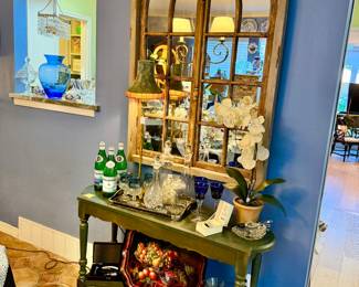 Love this mirror over a bar.