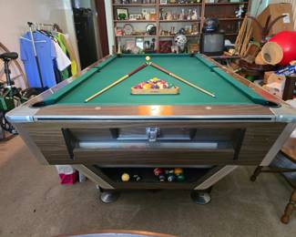 1970’s Coin Op 8ft Commercial Pool Table by Quality Billiards, Gardena Calif 50 cents to operate (2 quarters). Key included to coin box
New rails and felt cloth
4’9”W x 8’5”L x 2’8”H
3/4” solid slate top
Includes Aramith Pro Set pool balls and 2 cues Purchased used in 1998. Second owner