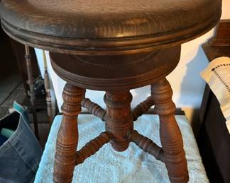 Piano stool - rotates up or down. Ball & claw feet