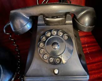 Black bakelite desk phone made in Holland