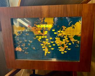 Howard Miller world clock - wall mount. Keeps time the world over. Lighted and works