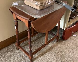 Small wooden drop-leaf table with turned legs