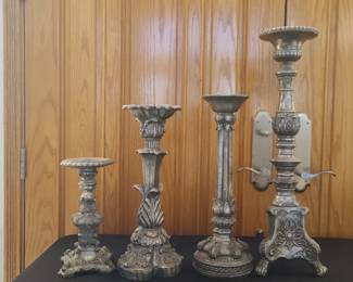 collection of ornate Baroquestyle candlesticks
