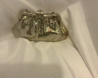 Silver colored handbag