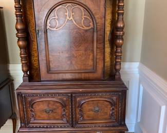  #2	china cabinet with 3 doors, burled wood and carving, 38x19x66 as is - tiny chip	 $300.00 			
		
