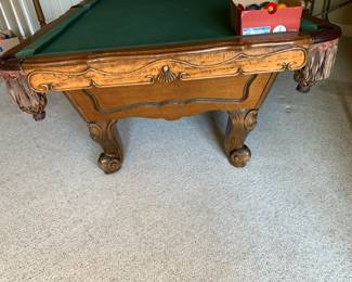 #93	Wood Pool Table w/balls & Pool Cues w/rack - 54x98 - You pay for movers upstairs (as is scratches)	 $300.00 			
