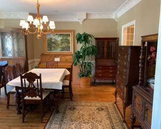 #1	walnut dining room table with 2 leaves hiding inside 60to96x40x30 with 5 chairs	 $225.00 			
